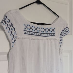 Elegant White Dress with Blue Embroidery